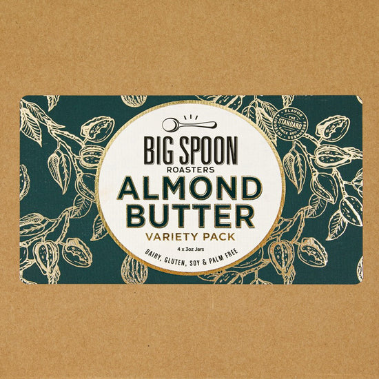 Big Spoon Roasters Almond Butter variety pack label on a brown background