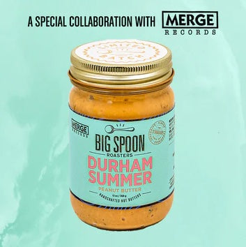 13oz glass jar of Durham Summer Peanut Butter in front of a textured teal background and black text that reads A Special Collaboration With Merge Records