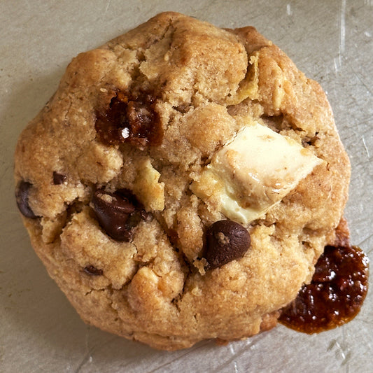 Cookie with toffee, chocolate chips, and chunks of white chocolate