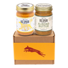 Jar of Vanilla Tater Wag Butter and a jar of Almond Butter with Wildflower Honey on top of a gift box