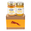 Jar of Vanilla Tater Wag Butter and a jar of Peanut Butter with Wildflower Honey on top of a gift box