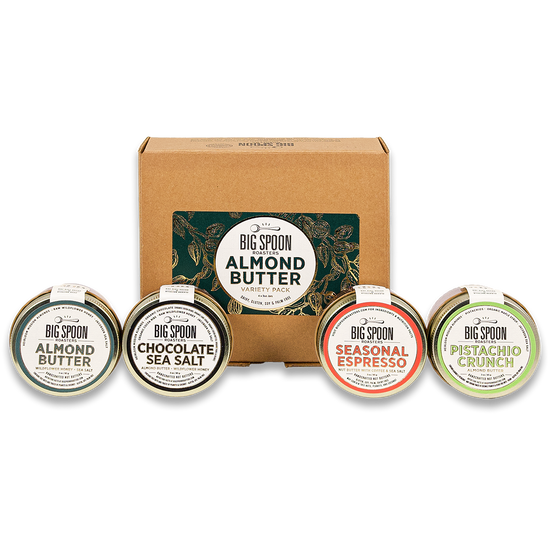 3oz Mini Almond Butter Variety Pack box with mini jars of Almond Butter, Chocolate Sea Salt Almond Butter, Seasonal Espresso Almond Butter, and Pistachio Crunch Almond Butter in front