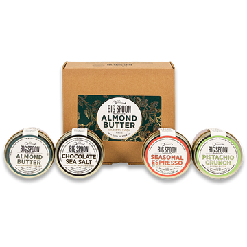 3oz Mini Almond Butter Variety Pack box with mini jars of Almond Butter, Chocolate Sea Salt Almond Butter, Seasonal Espresso Almond Butter, and Pistachio Crunch Almond Butter in front