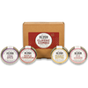 3oz Classic Combo Variety Pack box with mini jars of Chai Spice Peanut & Almond Butter, Maple Cinnamon Peanut & Pecan Butter, Peanut Butter, and Fiji Ginger Almond Butter in front