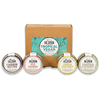 3oz Mini Tropical Vegan Variety Pack box with mini jars of Cashew Butter, Fiji Ginger Almond Butter, Lemon Cookie Cashew Butter, and Toasted Coconut Almond Butter in front
