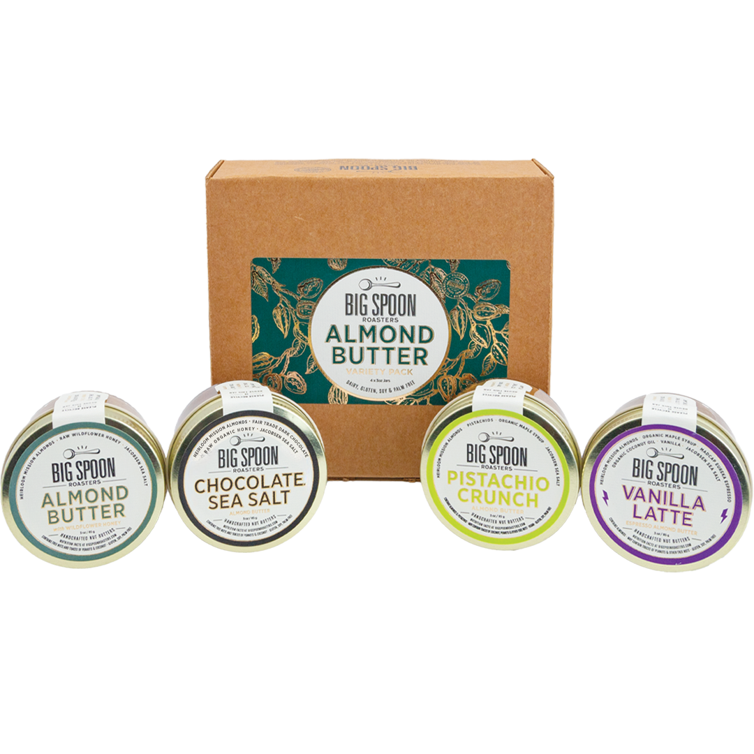 Collection of Big Spoon Almond Butter containers with a branded box on a white background