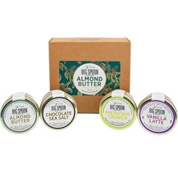 Collection of Big Spoon Almond Butter containers with a branded box on a white background
