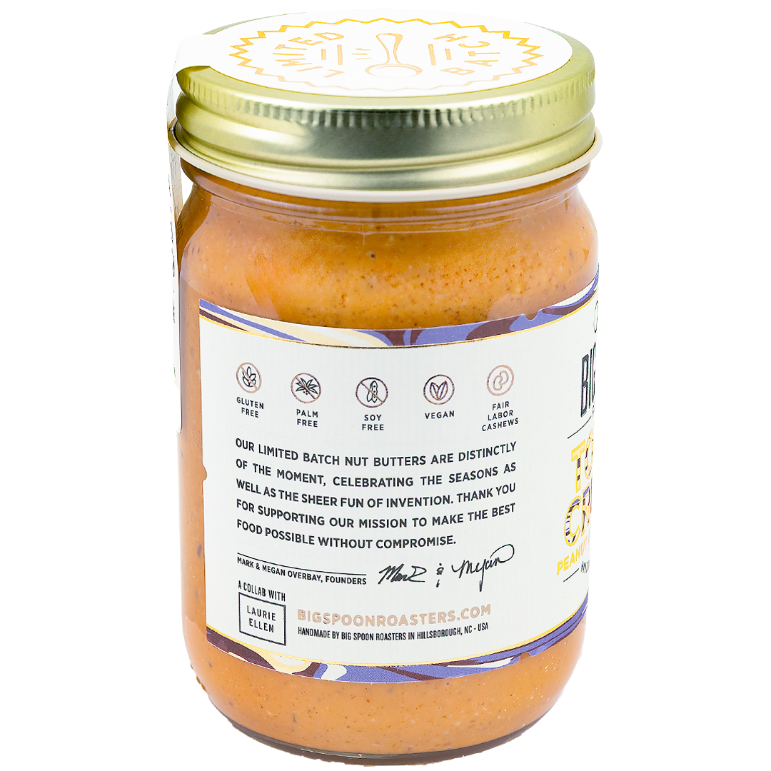Jar of Big Spoon Roasters Toffee Crunch peanut and cashew butter showing side label listing nutrition callouts