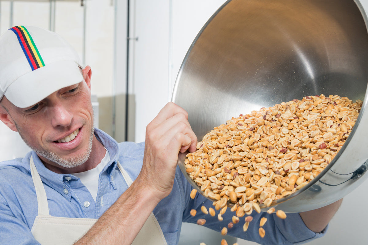 Mark Overbay pours a bowl of peanuts.