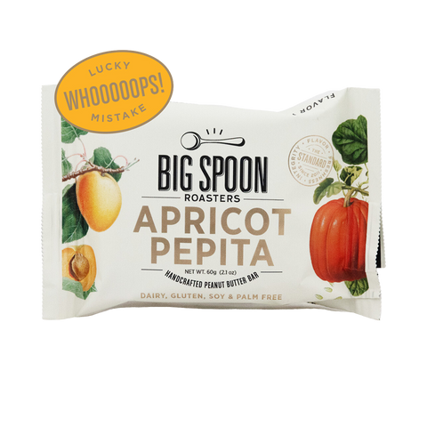 Big Spoon Roasters Apricot Pepita Bar with "Whoops! Lucky Mistake" sticker.