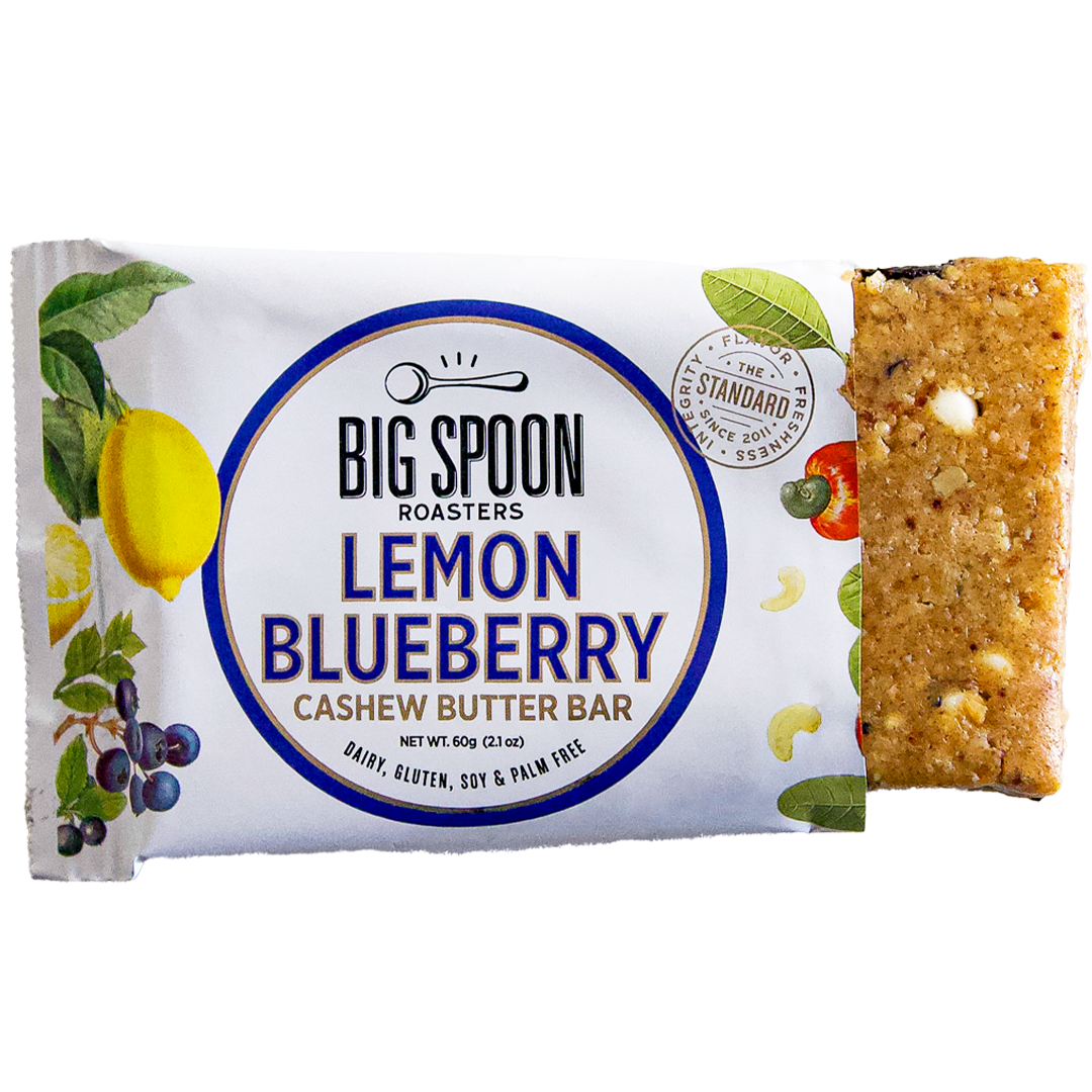 Lemon Blueberry Cashew Butter bar package, open on the right side and showing the bar