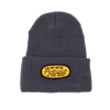 Gray beanie with a yellow patch embroidered with the words NUT BUTTER ACTIVIST | BIG SPOON ROASTERS