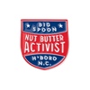pin reading "BIG SPOON NUT BUTTER ACTIVIST H'BORO NC"