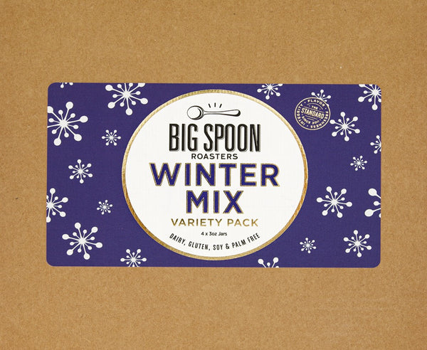 Cardboard box cover with Winter Mix Variety Pack Label on top, made with a deep blue background and white snow flake art
